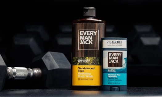 Every Man Jack x Baker Mayfield Deodorant next to a dumbbell.