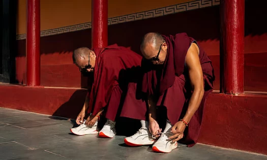 Monks donning PUMA shoes
