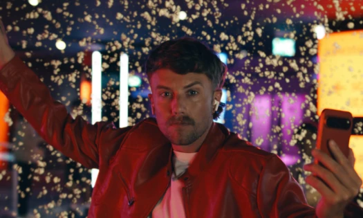 Roman Kemp with his mobile phone
