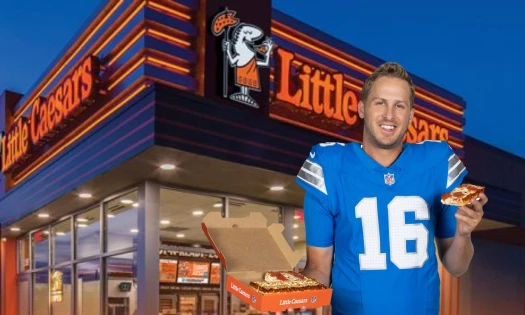 Detroit Lions quarterback Jared Goff holding Detroit-Style Slices-N-Stix
