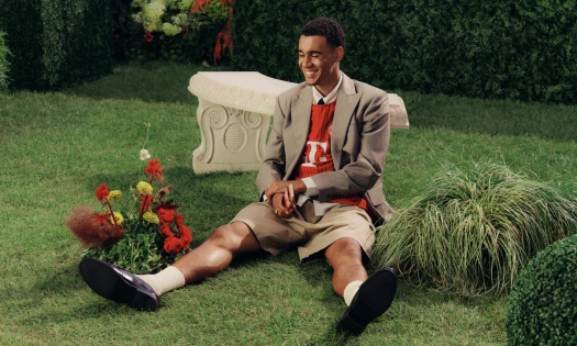 Jamal Musiala sitting in a garden