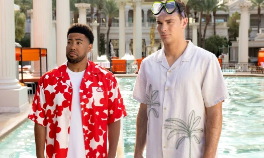 Jake from State Farm and Fernando Mendoza poolside.