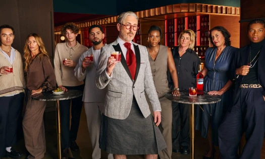 Alan Cumming and The Bitter Nine group photo with Campari drinks.