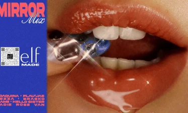 A woman biting into candy