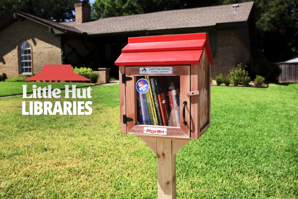 Pizza Hut's "little hut libraries" situated in a front lawn