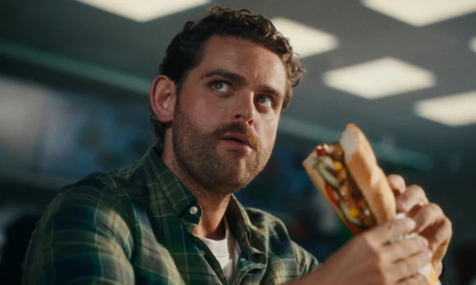 A man eating his Subway