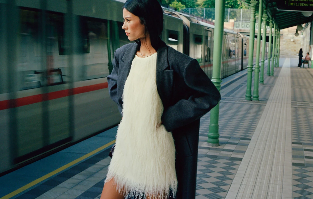 A woman waiting by the train