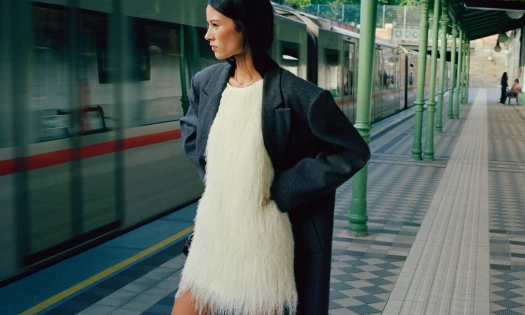 A woman waiting by the train
