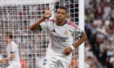 Mbappé celebrating after a hat trick for Real Madrid.