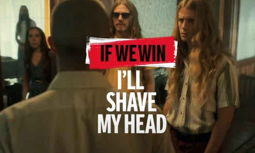 Fan with a shaved head walking into his home