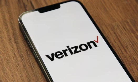 A decorative image showing Verizon’s logo on a smartphone screen
