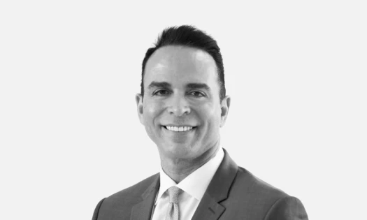Black and White headshot of Michael Valdes from eXp Realty on a white background.