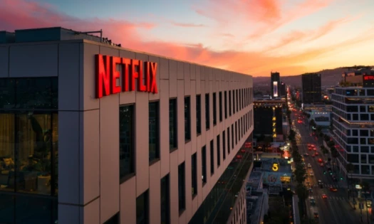A decorative image of a Netflix sign on top of a building