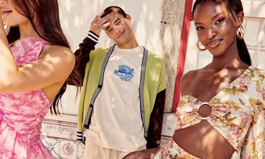 ASOS editorial campaign image with two women and one man in sunlight