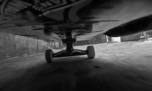 Black and white still of skateboard in Vans "This is Off The Wall" campaign