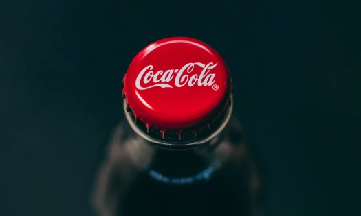 Coca-Cola logo on a bottle cap