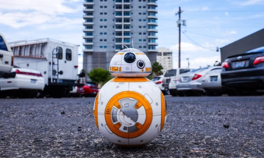 Photo of Star Wars' BB-8 robot in a parking lot