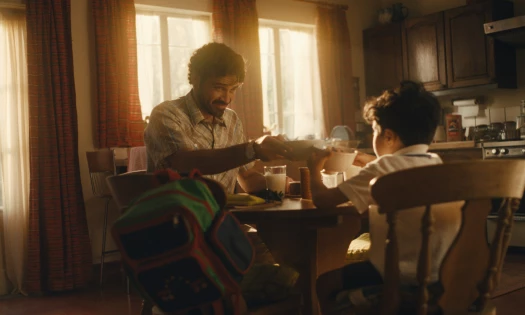 Father and Son Share a Bowl of Quaker Oats