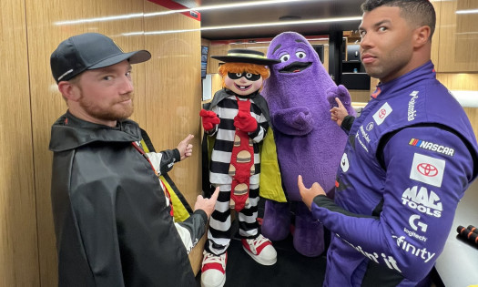 Bubba Wallace and Tyler Reddick with Hamburglar and Grimace