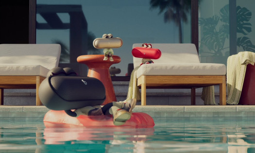 The Beats Pill People relax by the pool