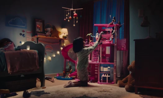 A child plays with her Barbie