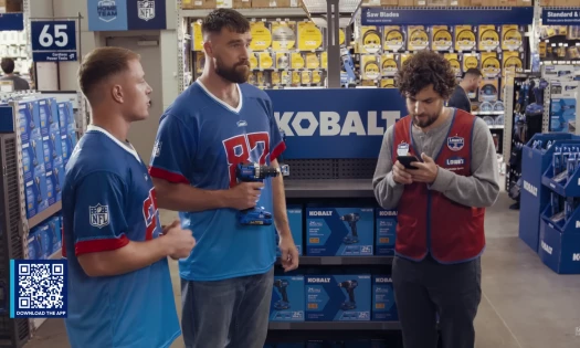 Travis Kelce and Christian McCaffrey in Lowe's