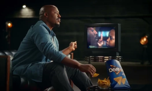 Dion Lack watches his old Doritos ad