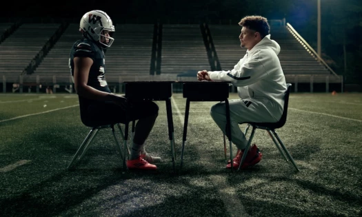 Patrick Mahomes and a young football player in Adidas commercial
