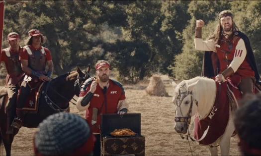 A war chief on a horse rallies his army for the 'Chicken Tenders Battle.'