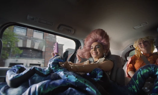 Photo still of a passenger taking a selfie from Lyft - 'Where Are You Going?'