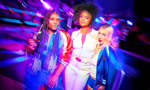 The Pepsi x Law Roach collection worn by three models