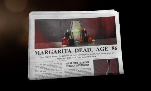 A Newspaper Showing A Tequila Cocktail in a Coffin