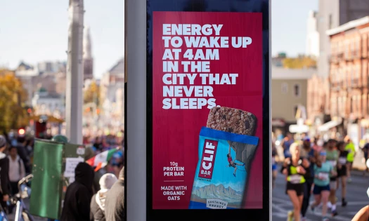 CLIF Bar billboard with runners in the background