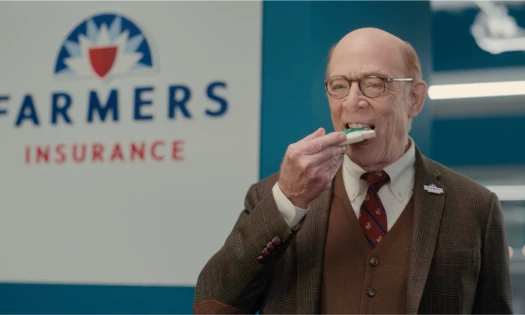 J.K. Simmons eating a christmas cookie
