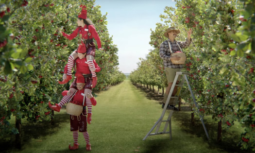 Photo of grandpa & grandon looking at Christmas ham