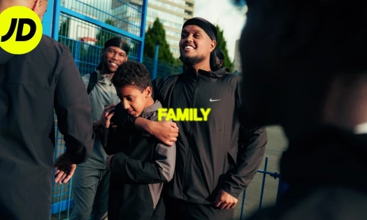 A man hugs his son in JD Sports Christmas spot