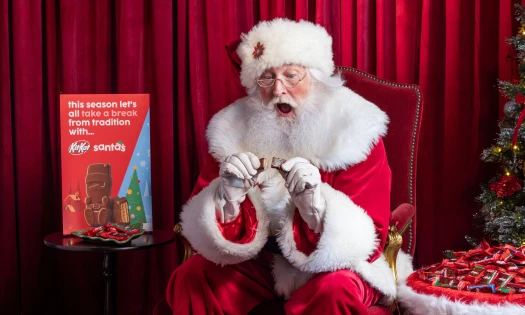 Santa breaks a Santa KitKat
