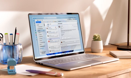 Work laptop with Microsoft Outlook on screen