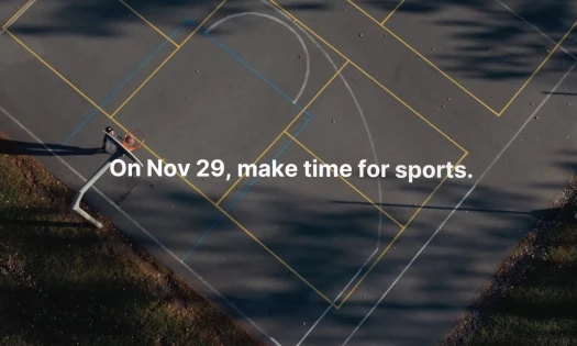 The message 'On November 29, make time for sports' superimposed on a basketball court