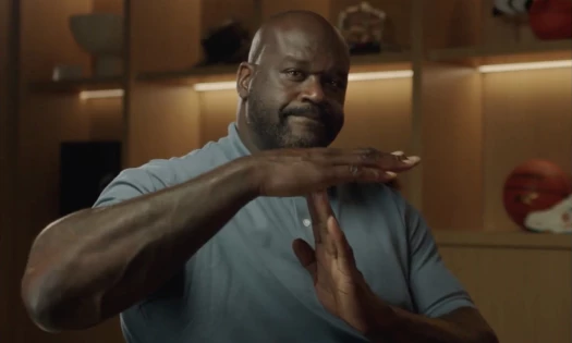 Shaquille O’Neal puts up the timeout sign