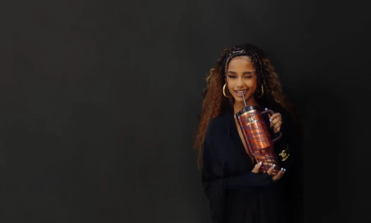 Tyla holds her new Stanley cup