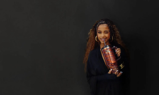 Tyla holds her new Stanley cup