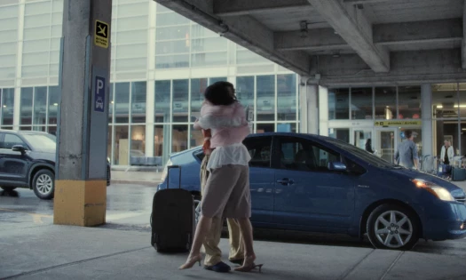 Friends hugging after meeting each other again.