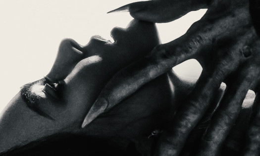 Nosferatu's hand on a woman's face