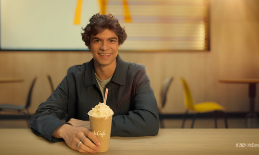 Iñaki Godoy holding a McDonald’s Dulce de Leche Frappe