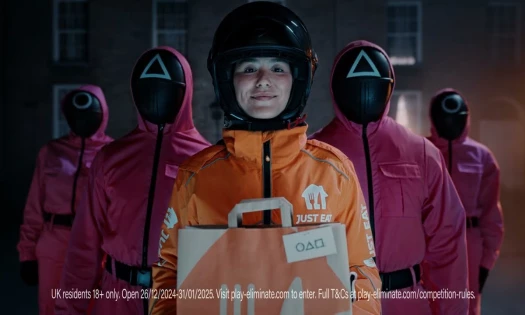 Just Eat delivery agent accompanied by Pink Guards