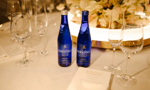 Saratoga Spring Water bottles on a table at the Golden Globes
