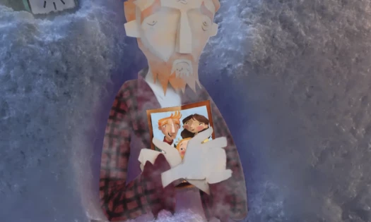 Man embracing a photo of his family