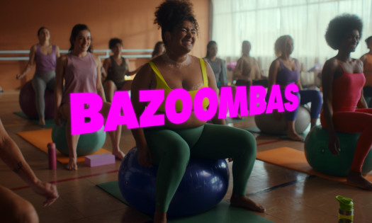 Women exercising with the word "Bazoombas" in hot pink