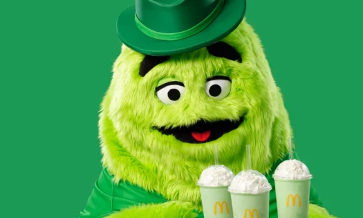 Uncle O'Grimacey holds Shamrock Shakes